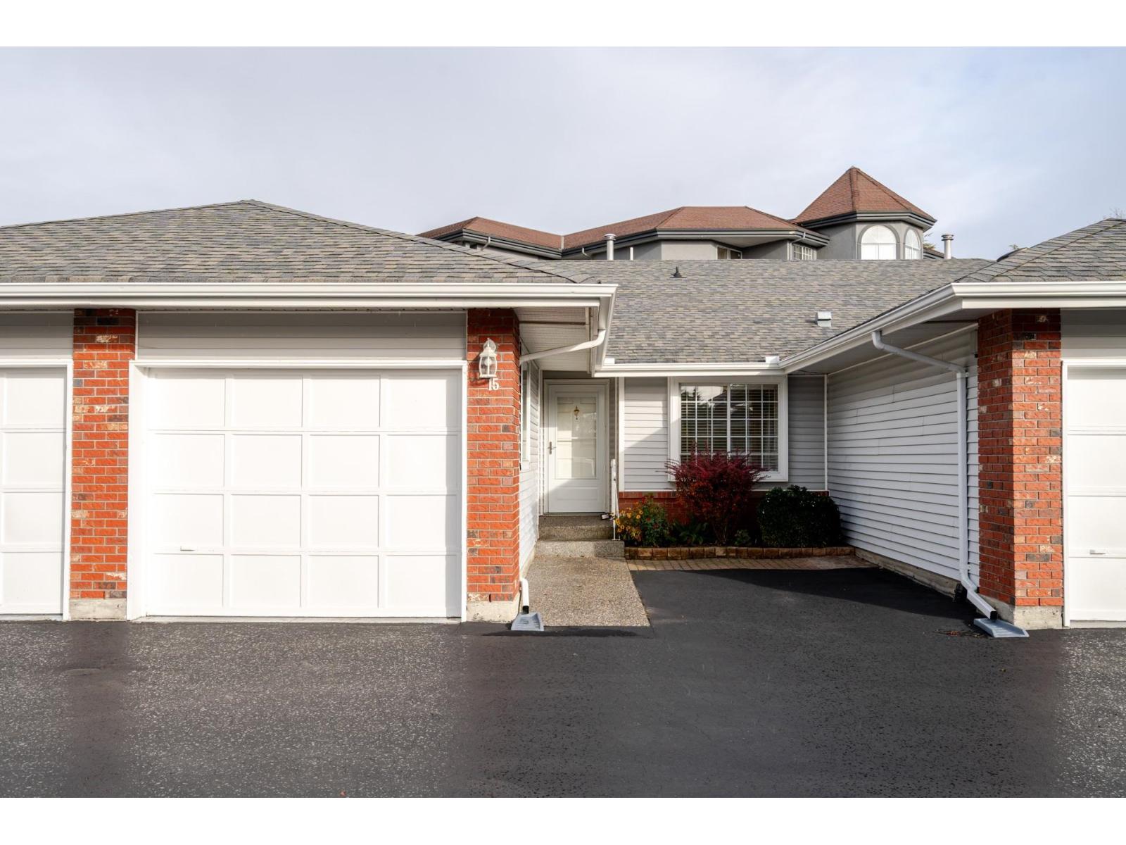 Front exterior and garage at Morningside Estates Unit 15