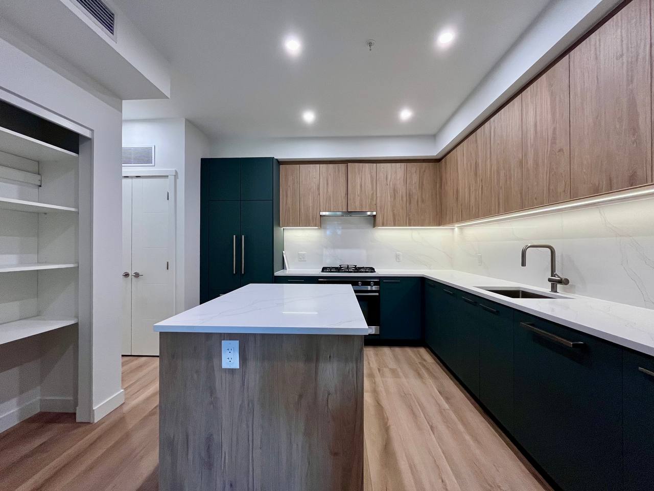 Kitchen with island in Unit 206 at Lodana